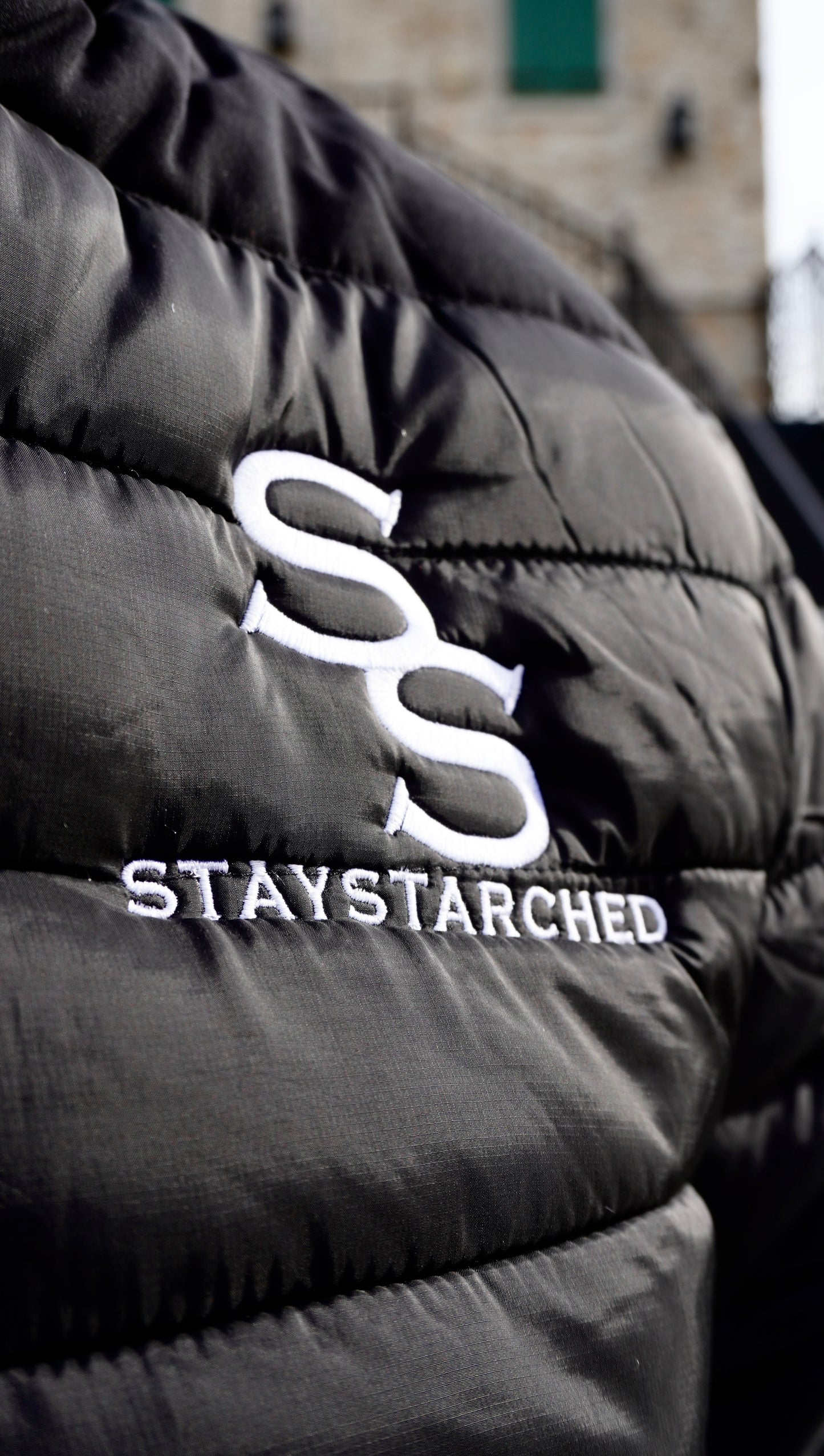BLACK STAYSTARCHED PUFFER JACKET