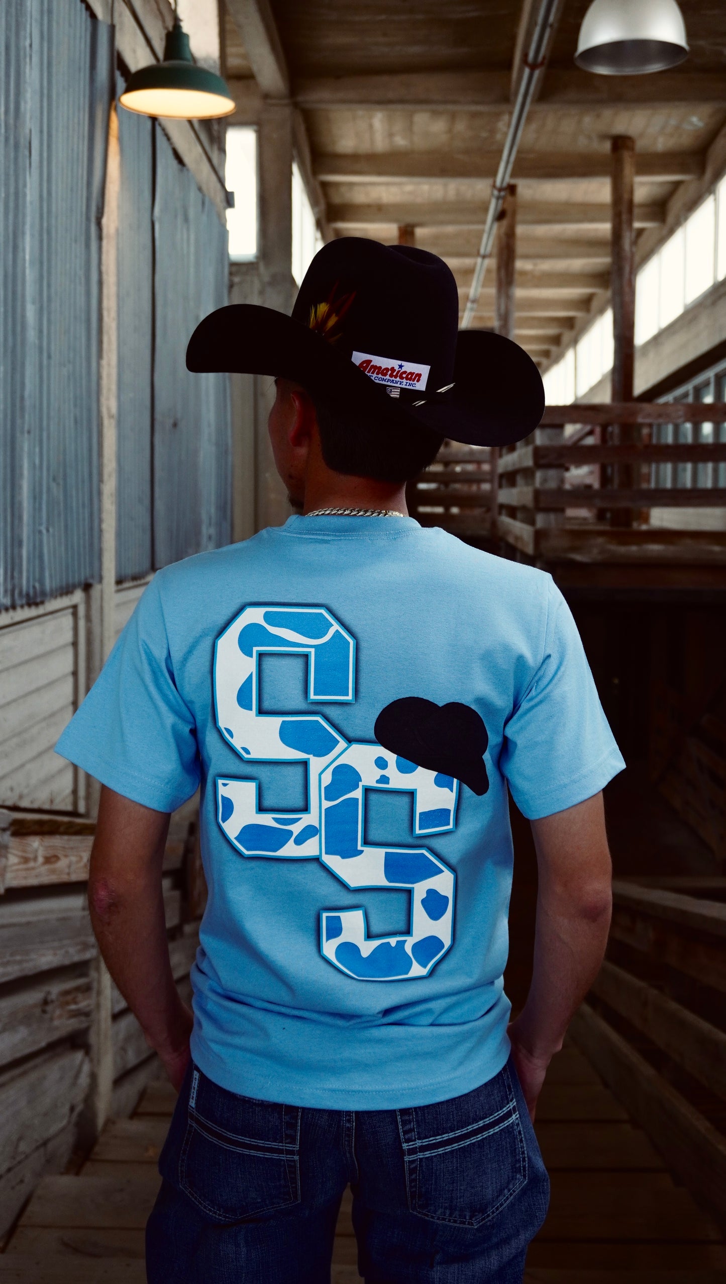 BABY BLUE COW PRINT SS T-SHIRT